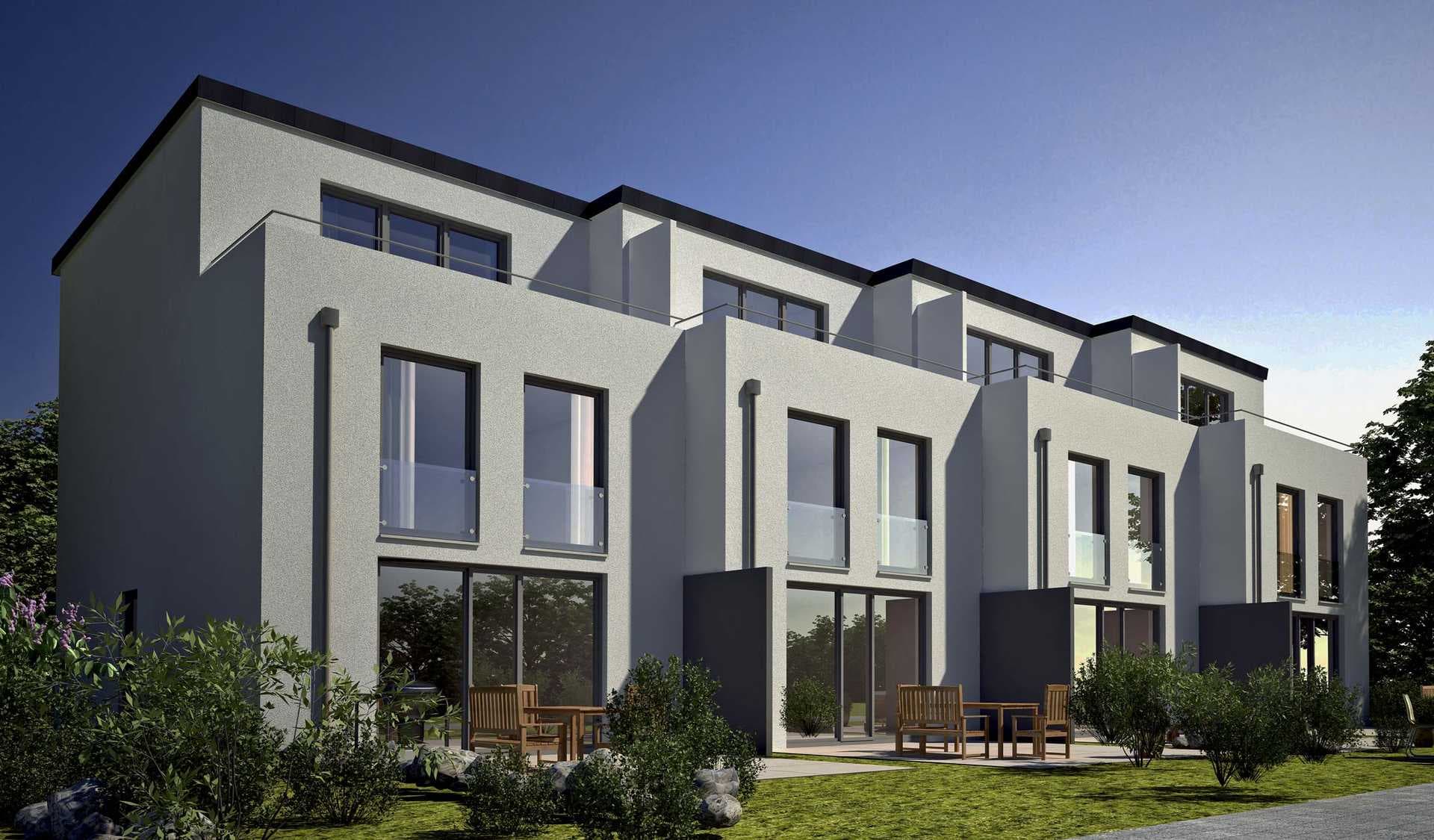 Mehrfamilienhaeuser im Abendlicht